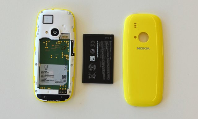 The back comes off, the battery comes out and there’s even a microSD card slot. Photograph: Samuel Gibbs for the Guardian
